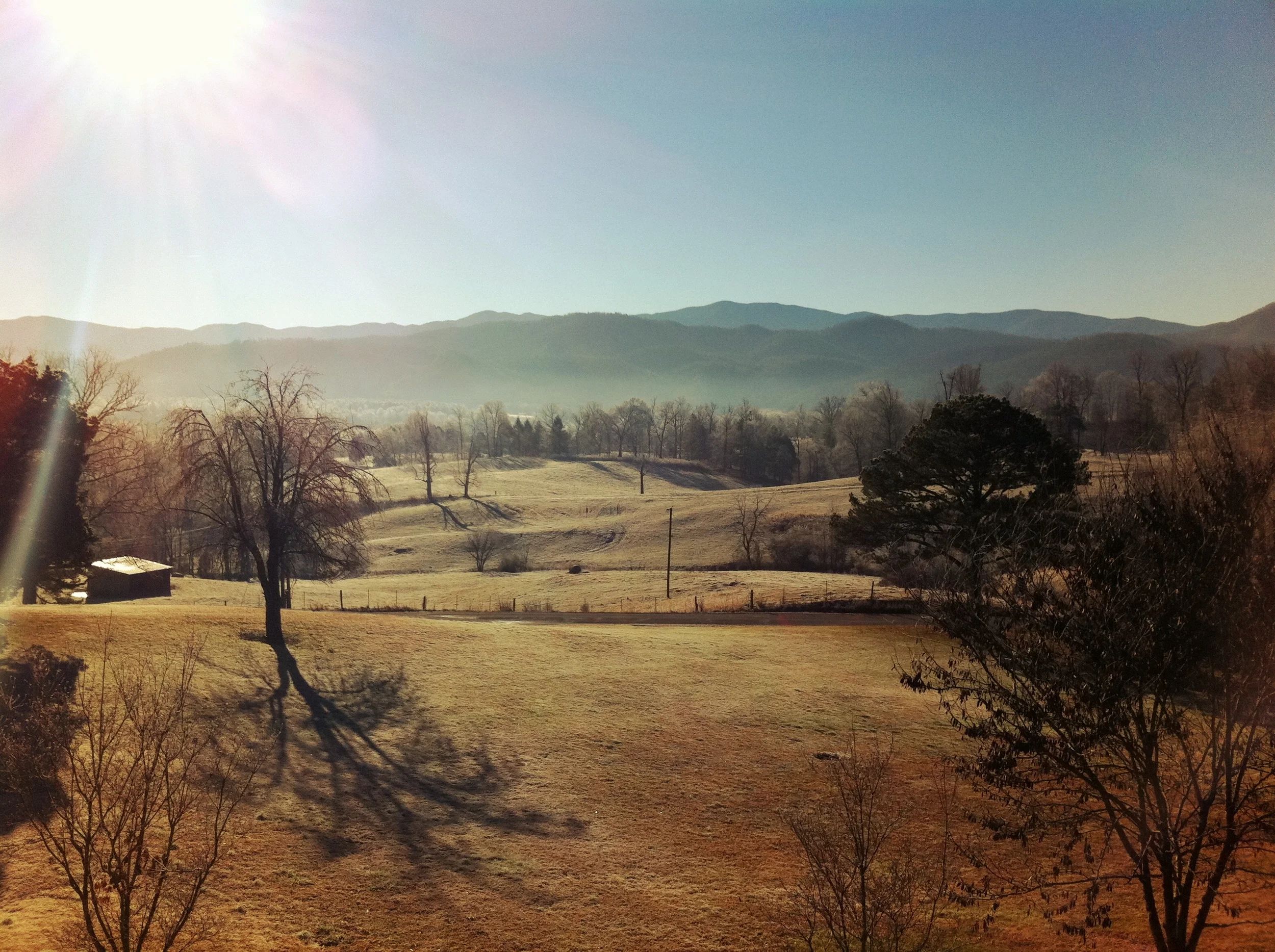 Fall color spread across the ridgelines seen from the property
