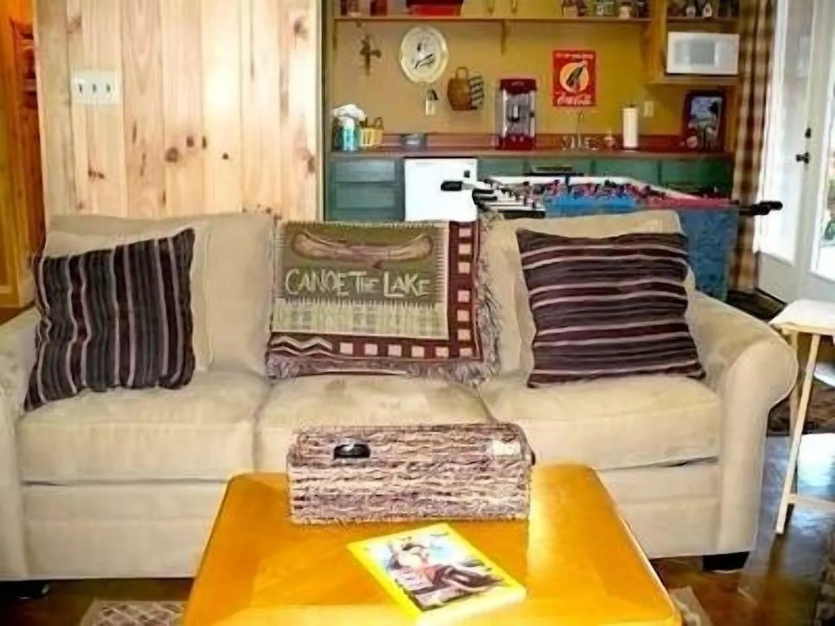 Foosball table and a comfortable lounge area in the game room